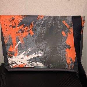 Orange splattered Ck messenger bag